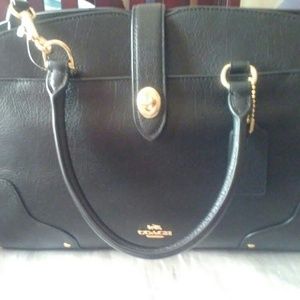 Black leather coach purse brand new with tags